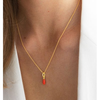 Model wearing Coral Necklace in gold-plated silver – feminine and elegant style.