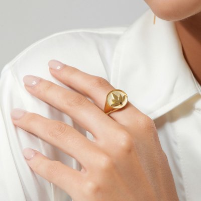 Gold-plated Lotus ring worn by female model – East Copenhagen Jewellery design.