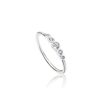 Elegant rhodium-plated silver ring with hand-set cubic zirconia from Cham Bi, sustainable design with timeless shine.