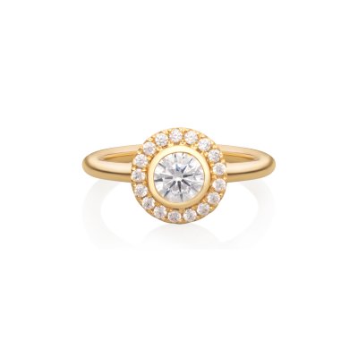 Flower ring in 24k gold-plated recycled sterling silver with 18 hand-set cubic zirconia, elegant nature-inspired statement piece.