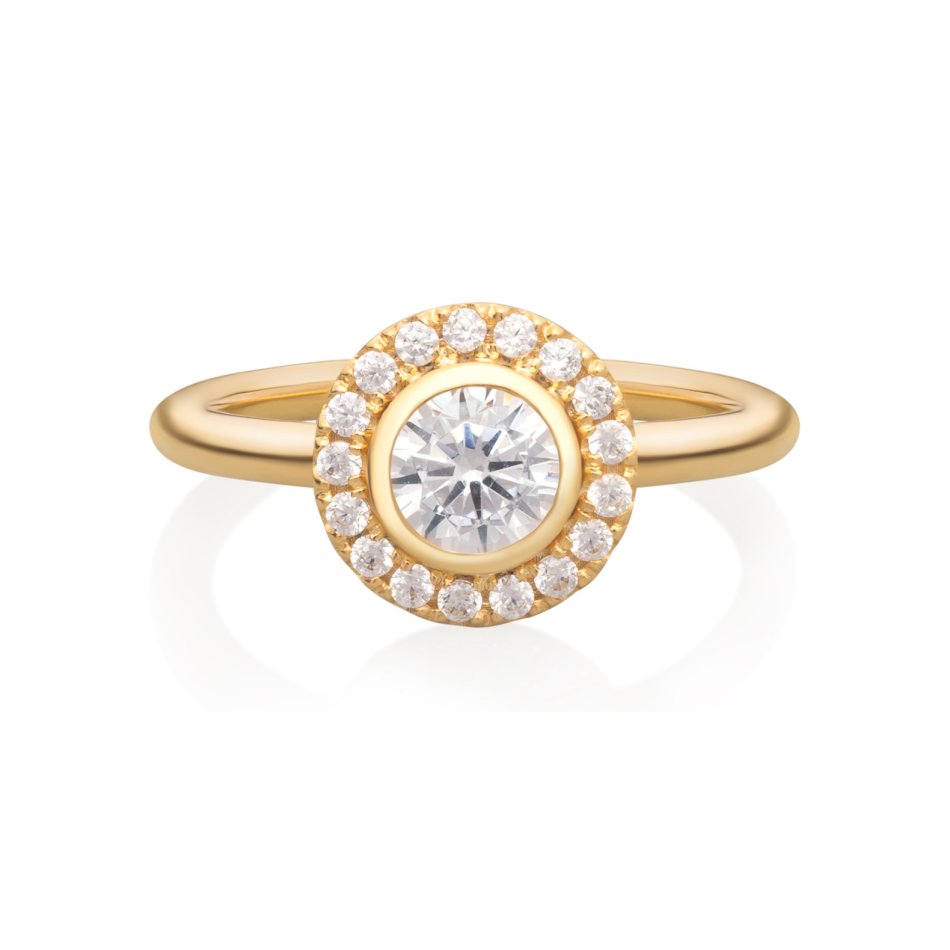 Flower ring in 24k gold-plated recycled sterling silver with 18 hand-set cubic zirconia, elegant nature-inspired statement piece.