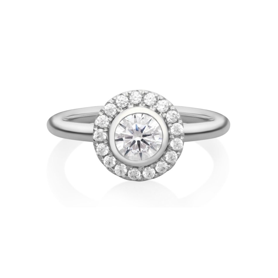 Flower ring in rhodium-plated recycled sterling silver with 18 hand-set cubic zirconia, elegant nature-inspired statement piece.
